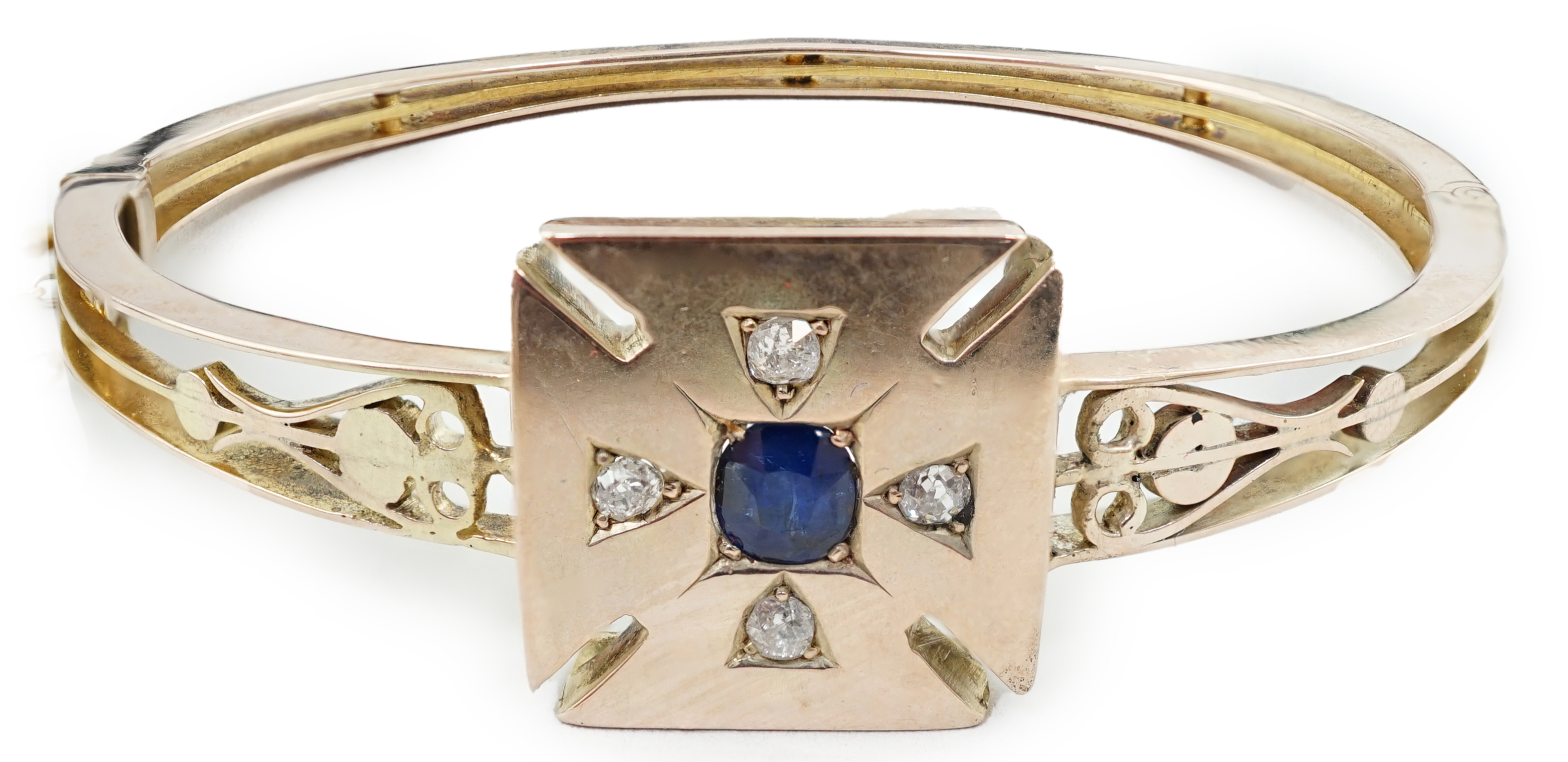 A Victorian gold, single stone sapphire and four stone diamond set hinged bracelet